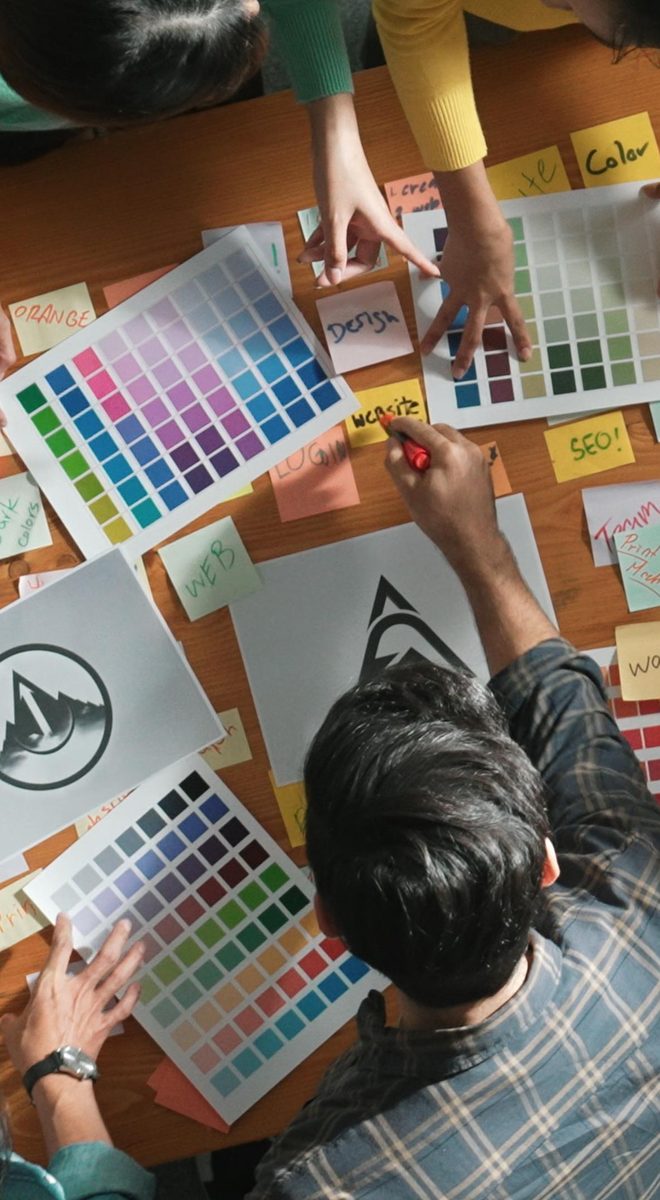 Designer's desk with colour swatches and sketches